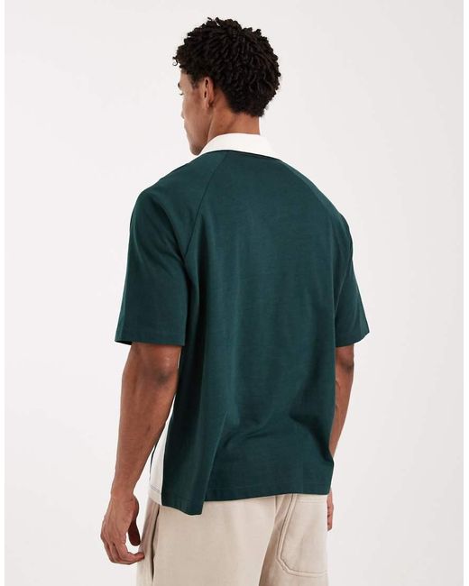 ASOS Green Relaxed Polo T-Shirt With Panels And Football Graphic for men