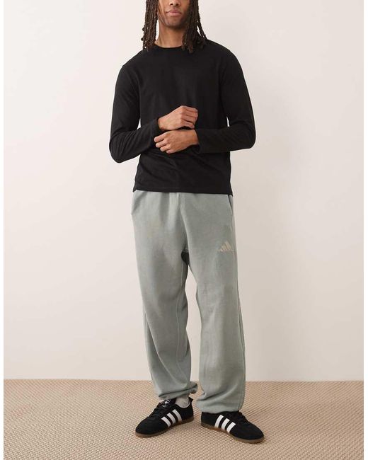 Adidas Originals Black Adidas Sportswear Track Pants for men