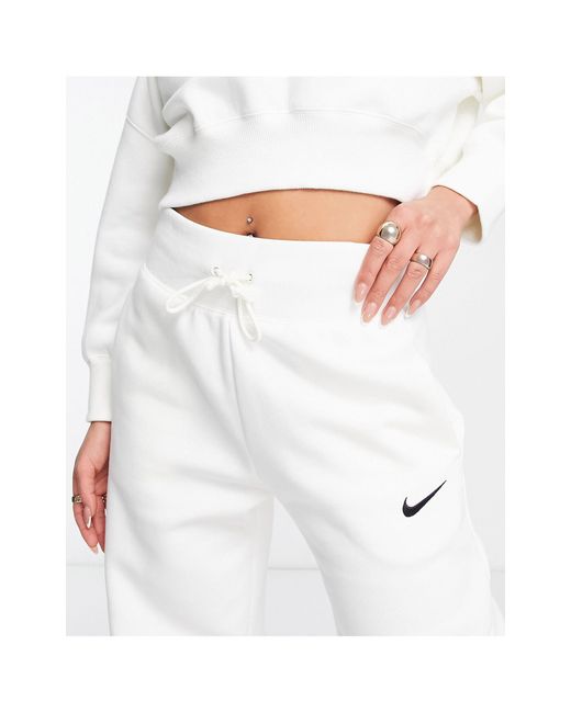 Nike joggingbroek Met Mini-swoosh, Hoge Taille En Wijde Pijpen in het White