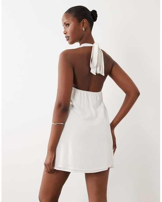 The Frolic White Exclusive Linen Halterneck Mini Dress