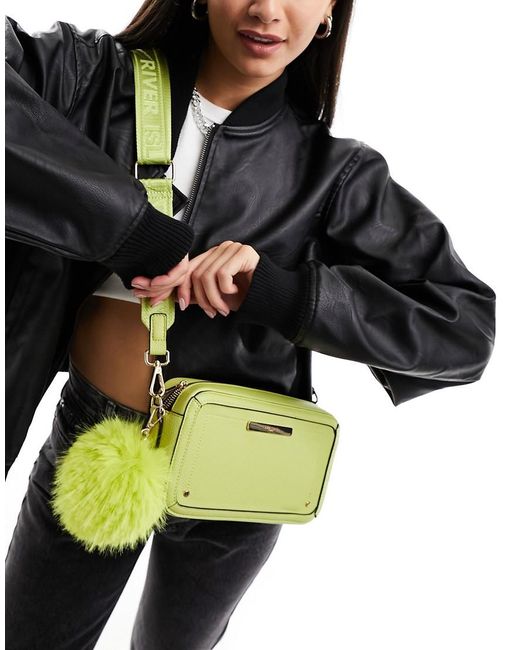 Bolso Verde Lima Con Pompón De River Island de color Green
