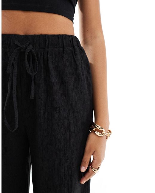 In The Style White X Perrie Sian Exclusive Textured Tie Waist Wide Leg Beach Trousers