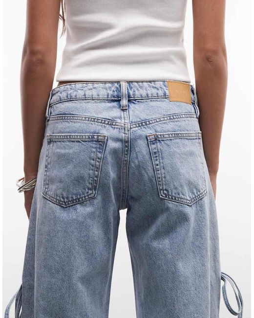 Monki Blue Low Waist Wide Leg Jeans With Side Tie Bow Detail
