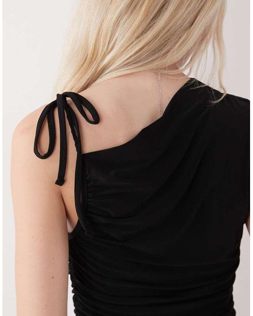 Reclaimed Vintage Black Mini Skort Dress With Shoulder Tie Detail
