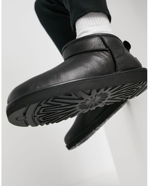 UGG Leer Classic Ultra - Mini-enkellaarzen Van Zwart Leer in het Bruin -  Lyst