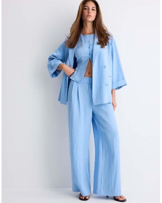 Stradivarius Blue Sleeveless Buttoned Top