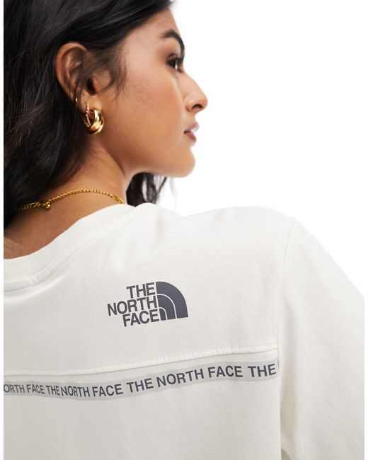 Zumu - t-shirt sporco con logo di The North Face in White