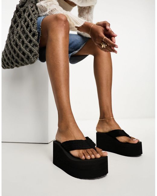 ASOS Tye Toe Thong Wedge Sandals in Black | Lyst Canada