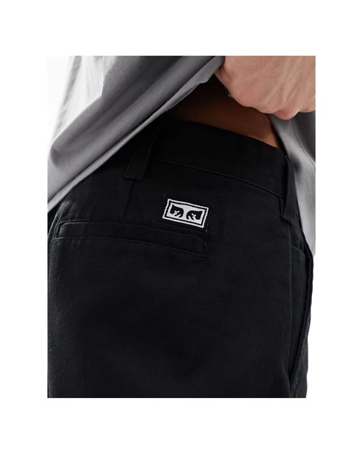 Hardwork - pantaloni dritti effetto consumato slavato di Obey in Black da Uomo
