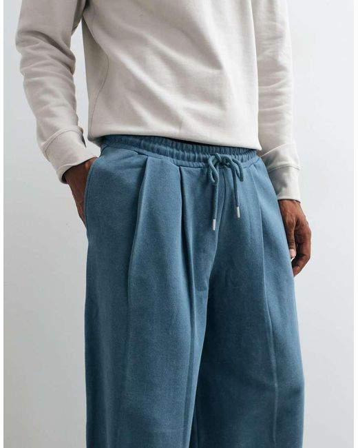 ASOS Blue Oversized Balloon joggers With Acid Wash for men