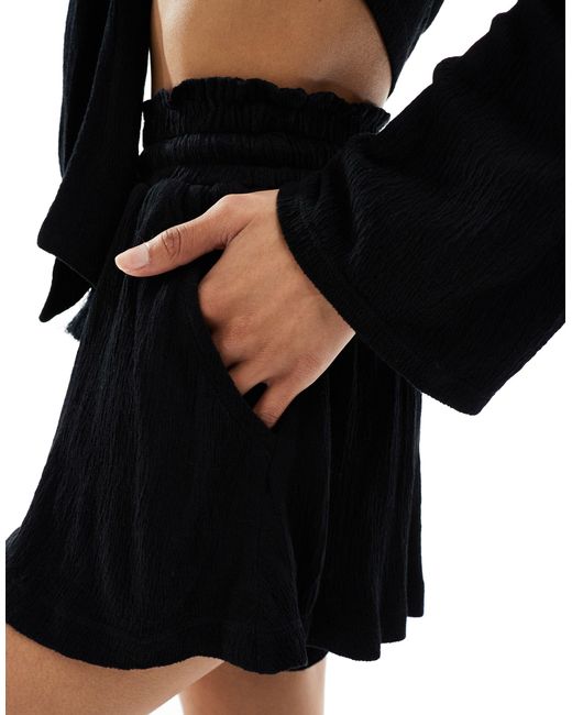 ASOS Black Co-ord Textured Tassel Tie Waist Flippy Shorts