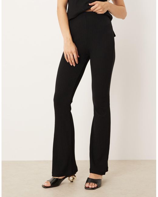ASOS Ribbed Flare Pants in Black | Lyst