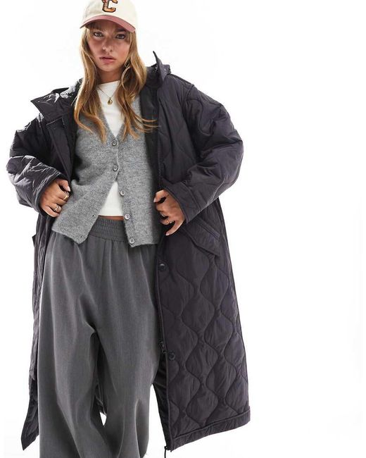 Giacca Taglio Lungo Nera Trapuntata Con Cappuccio di ASOS in Black
