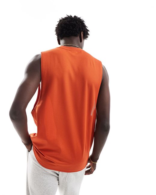 Camiseta neón sin mangas holgada ASOS de hombre de color Orange