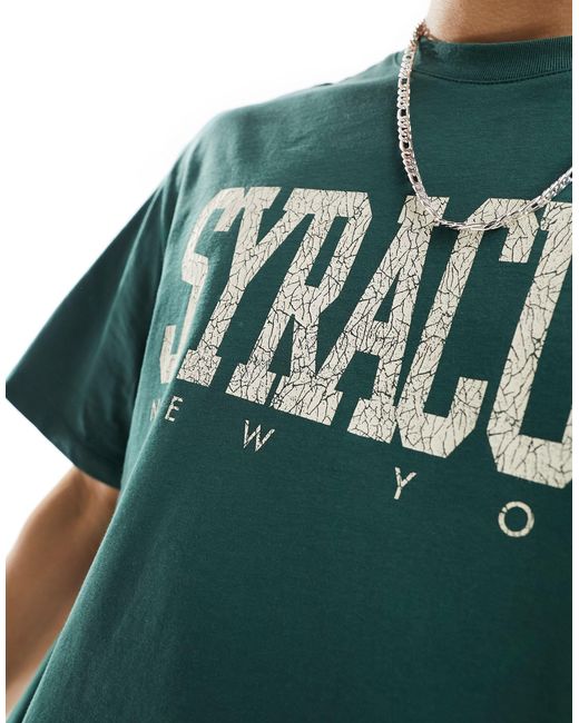T-shirt bosco con stampa "syracuse" sul davanti di Bershka in Green da Uomo