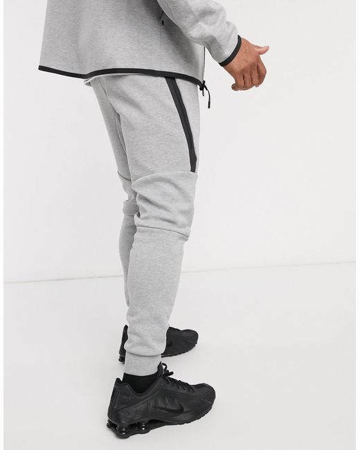 nike tech fleece skinny joggers in grey