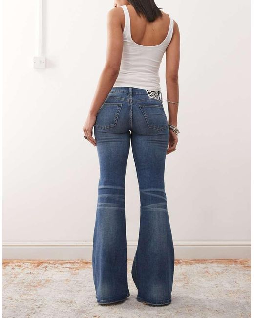 Cheap Monday Blue Flare Low Stretch Jeans