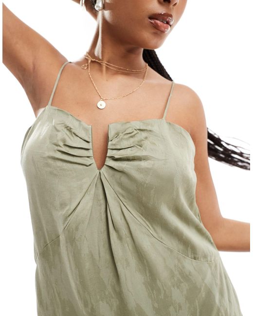 Object Green – trägerkleid mit em jacquard-print und korsettbügel am ausschnitt
