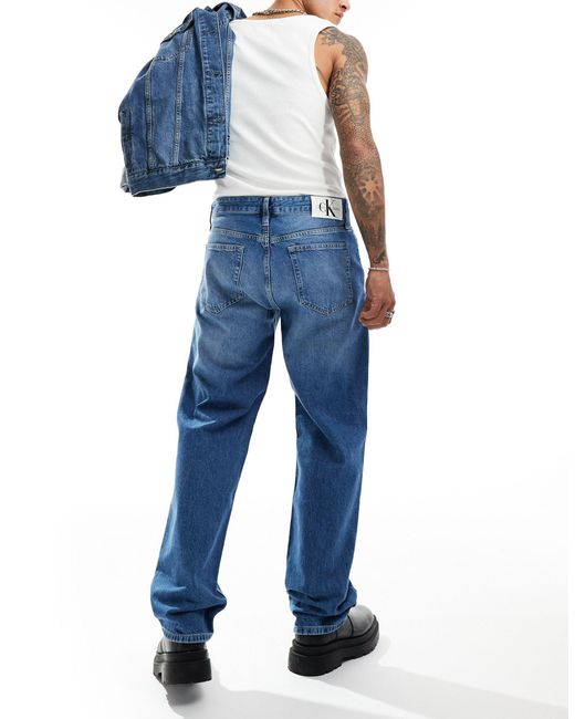 Jean droit style années 90 - clair délavé Calvin Klein pour homme en coloris Blue