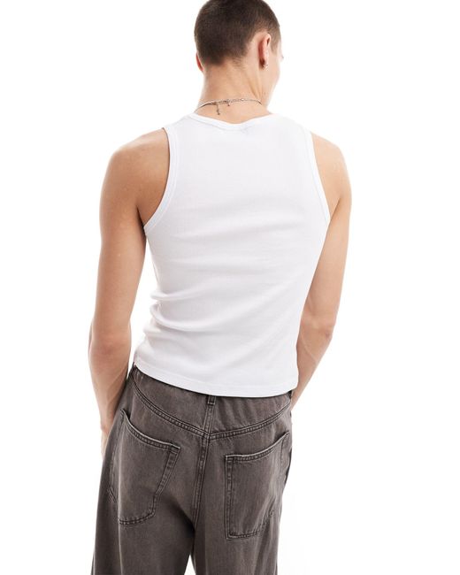 Camiseta blanca sin mangas con logo estampado Reclaimed (vintage) de hombre de color White