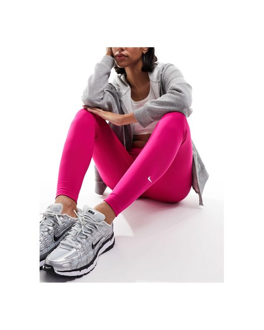 Leggings arándano Nike de color Pink