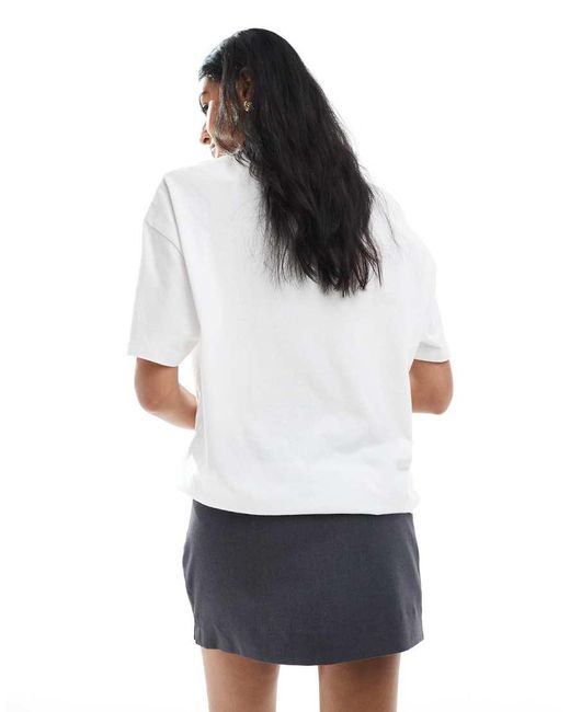 Monki White Low Waist Mini Skirt With Conceled Pocket