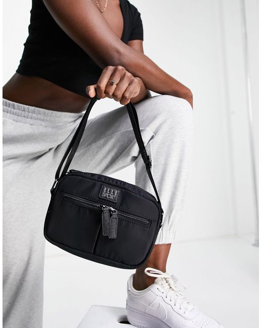 ELLE Sport Black Nylon Two Pocket Crossbody Bag