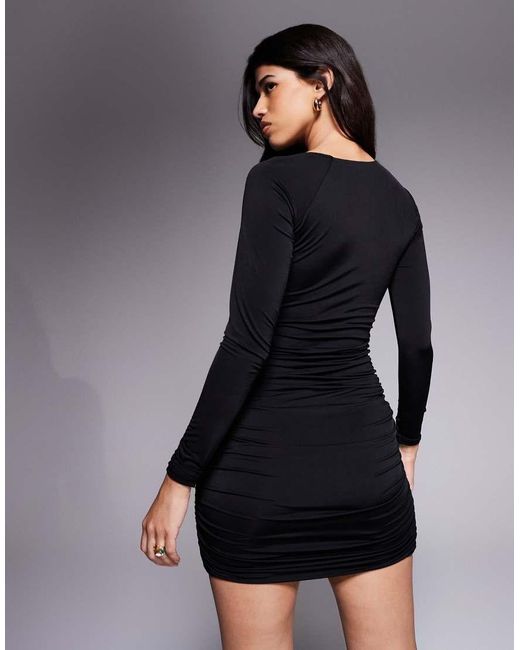 Ruched & Ready Asymmetrische Bodycon Mini Jurk Met Uitsnijding En Gouden Hardware in het Black