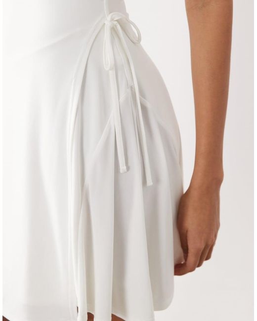 Kaiia White Exclusive Double Layered Slinky High Neck Long Sleeve Tie Side Skater Mini Dress