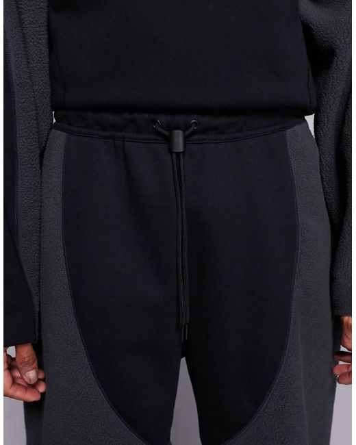 Nike Black Tech Boreas Open Hem joggers for men