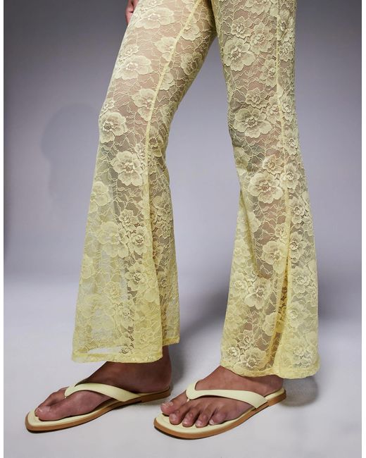 Pantalon ultra évasé à taille haute en dentelle transparente ASOS en coloris Yellow