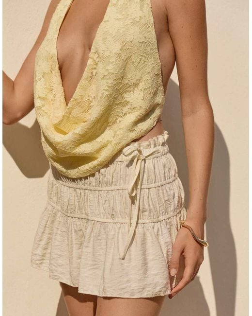 The Frolic Natural Exclusive Shirred Tie Side Frill Mini Skirt