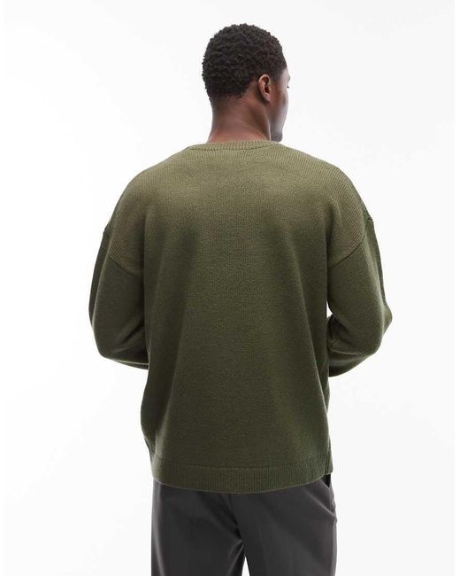 ASOS Green Relaxed Knitted Christmas Jumper With Merry Christmas Ya Filthy Animal Slogan for men