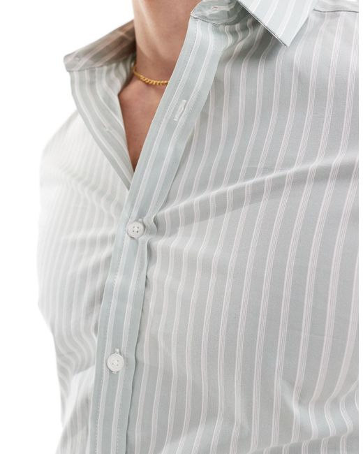 Camicia skinny chiaro a righe con maniche risvoltate di ASOS in White da Uomo