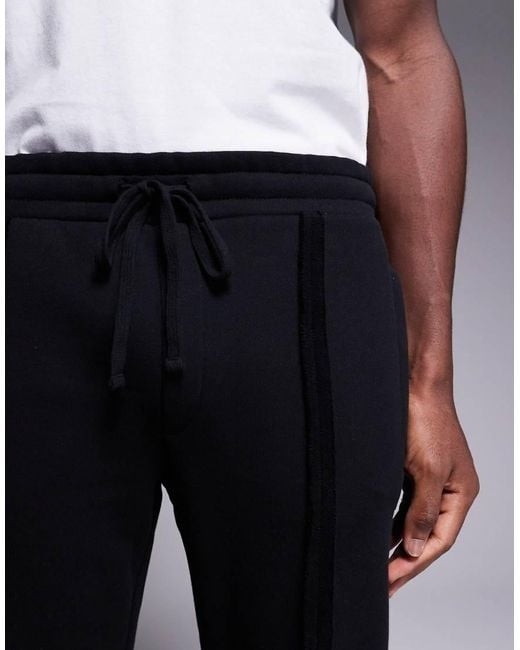 Joggers Negros Con Costuras Sin Rematar De (Parte De Un Conjunto) The Couture Club de hombre de color Blue