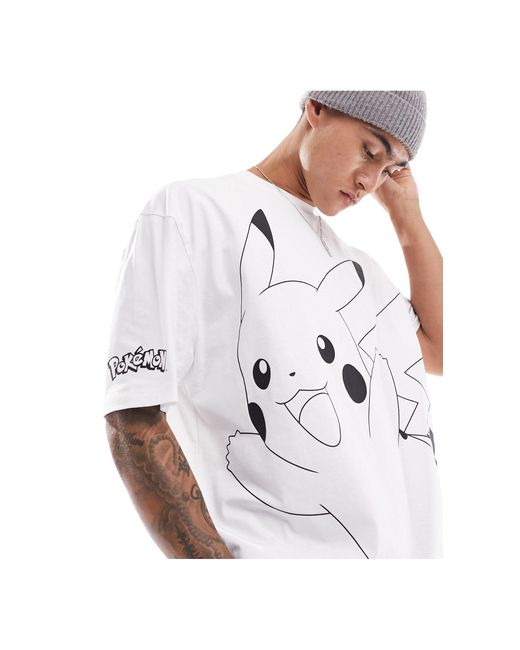 T-shirt oversize unisex bianca con stampa pokémon su licenza con pikachu di ASOS in White