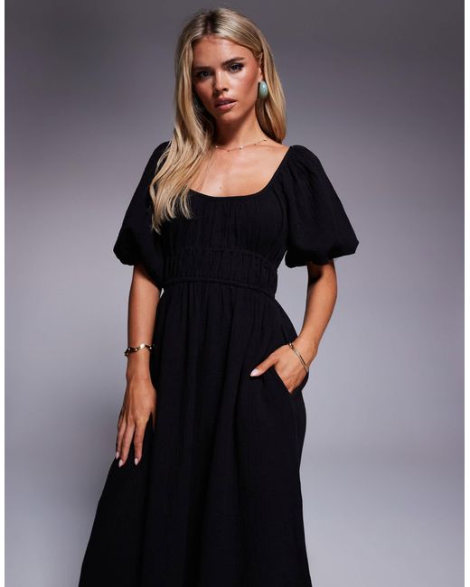 Robe mi-longue en aspect lin avec manches bouffantes River Island en coloris Black