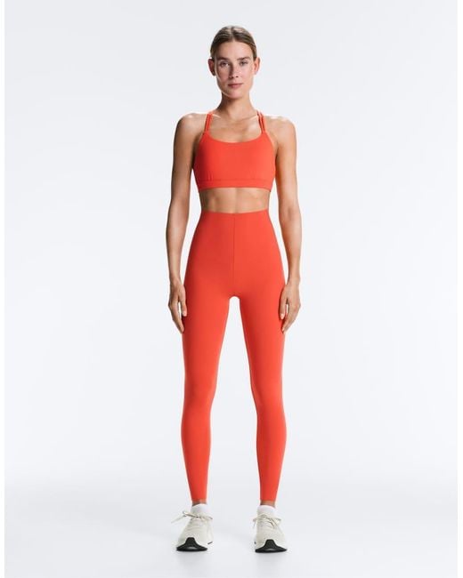 Oysho Red Compressive Core Control Ankle-length leggings