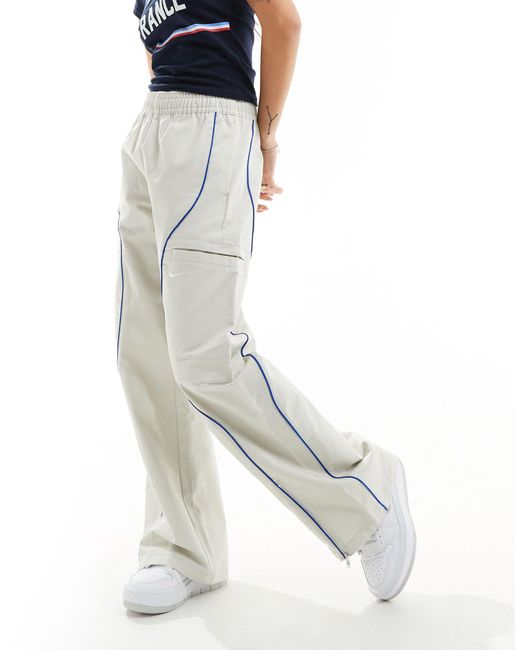 Pantalon tissé - ivoire clair Nike en coloris Blue