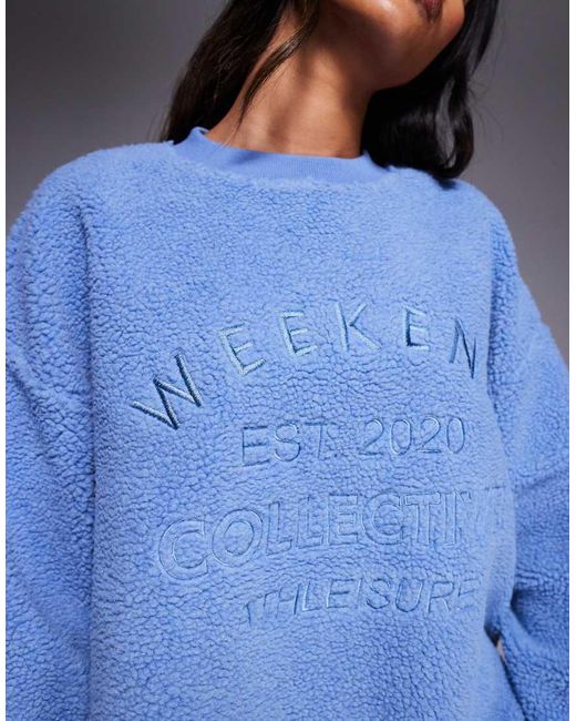 ASOS Blue Weekend Collective Borg Sweatshirt With Embroidered Graphic