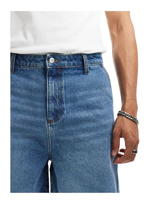 Short classique en jean à détails charpentier - moyen délavé ASOS pour homme en coloris Blue