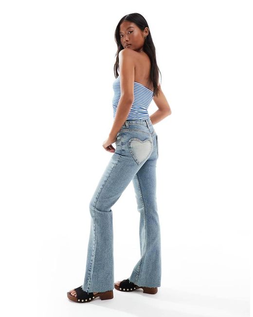 Vaqueros De Campana Con Lavado Deslucido Y Bolsillo En Forma De Corazón De -Azul Miss Selfridge de color Blue