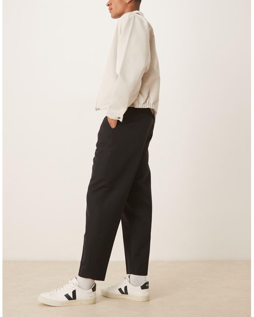Pantalon habillé oversize fuselé ASOS pour homme en coloris Black