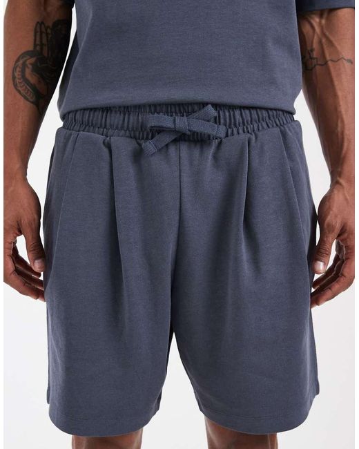 ASOS Blue Circular Design Collection Pleated Oversized Jersey Shorts for men