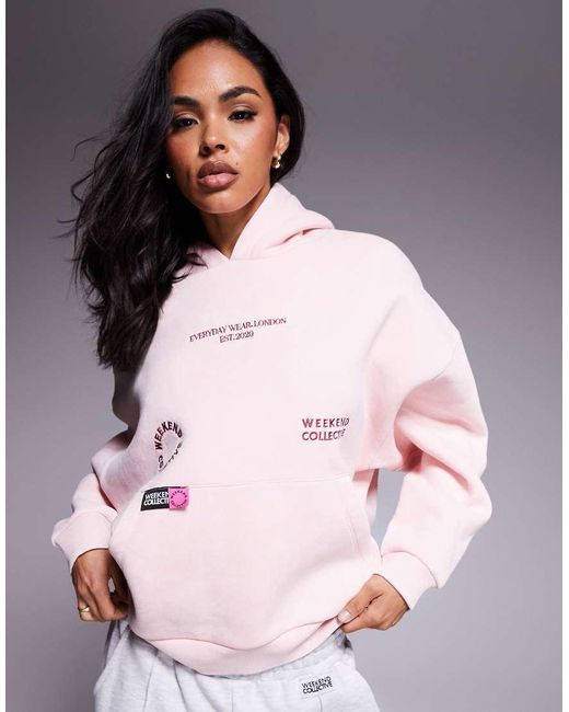 ASOS Pink Weekend Collective Hoodie With Bright Label Detail