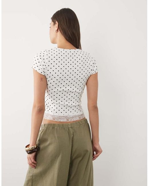 New Look White Polka Dot Baby Tee With Lace Hem