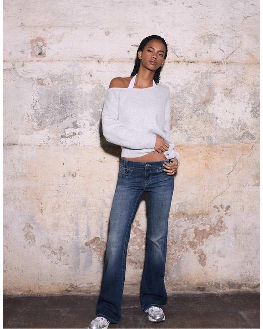 Stradivarius Blue Embroidered Pocket Bell Bottom Jeans