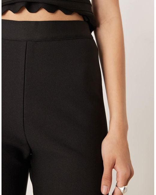 Amy Lynn White Flared Pants