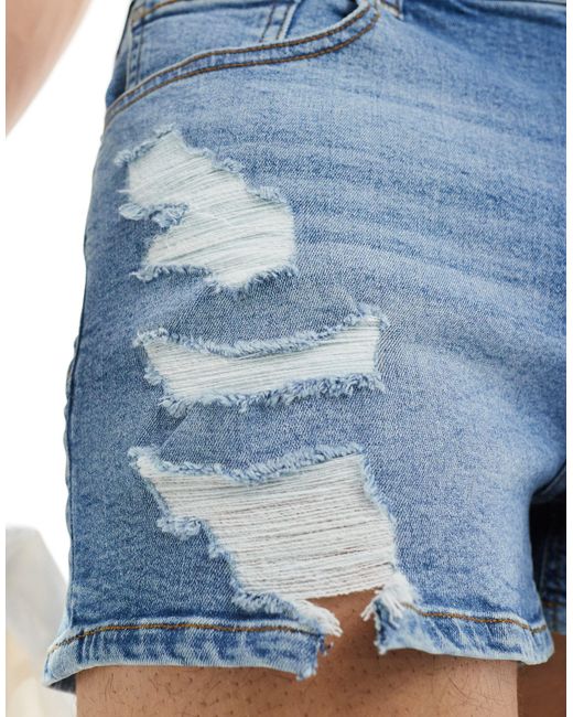Pantaloncini di jeans skinny taglio super corto lavaggio medio con strappi di ASOS in Blue da Uomo