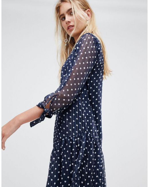 spotty navy dress